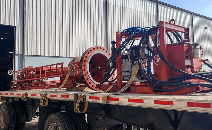 Pipeline hot tapping machines shown on a truck bed ready for shipping to the job site
